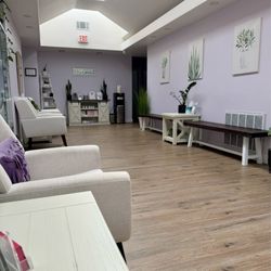 Nurturing Touch Massage & Acupuncture - Waiting room is decorated beautifully