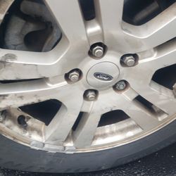 Walmart Supercenter - The greasy mess they left on my hubcap