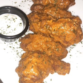 The Last Stop - Butter Chicken Wings - Bars Near Me - Bronx, New York The Last Stop - Butter Chicken Wings - Bars Near Me - Bronx, New York