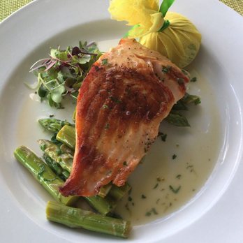 Pelican cafe - Alaskan king salmon with asparagus - Italian Near Me - Miami Beach, Florida Pelican cafe - Alaskan king salmon with asparagus - Italian Near Me - Miami Beach, Florida