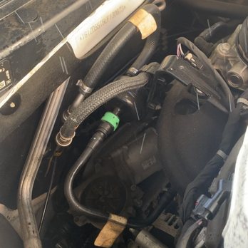 Capitol Chevrolet - White streaks is gasoline splattering- puddle under car - DANGEROUS- Capital couldn't care less AVOID - Auto Repair Near Me - Austin, Texas