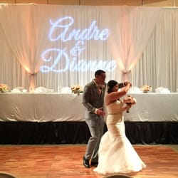 DJ Neekz - Custom Monogram on a Pipe and Drape Backdrop, really makes a wedding pop!