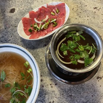 Pho Hoang - Wagyu pho. Cook meet in the small heated pot. Prevents your bowl of pho to lose the original taste of the broth - Vietnamese Near Me - Vallejo, California Pho Hoang - Wagyu pho. Cook meet in the small heated pot. Prevents your bowl of pho to lose the original taste of the broth - Vietnamese Near Me - Vallejo, California