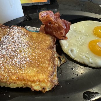 Daddy O’s - A quite delicious and tasty plate of French Toast, fried eggs, and bacon. - New American Near Me - Lihue, Hawaii