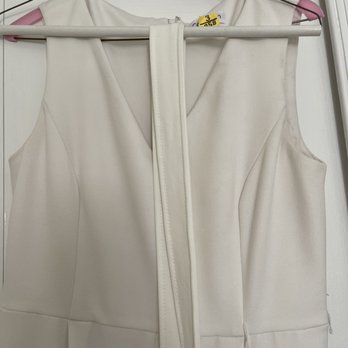 Cleaner4Less Ashburn - Looks like they cleaned the belt properly. Notice the color difference between the belt and the jumpsuit. - Dry Cleaning Near Me - Ashburn, Virginia