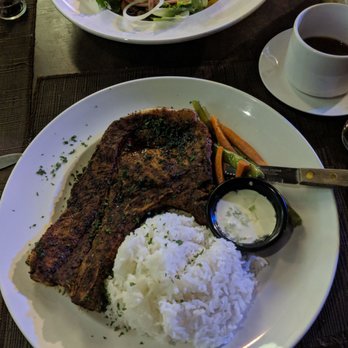 Vue Dine & Drink - Cajun pork chop. Fairly big cut with country rib and a little pork belly bonus. - Restaurants Near Me - Lapu-Lapu City, CEB