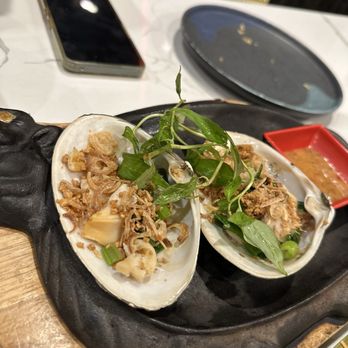 Ocean Grill & Bar - O8. Nghu Nuong Mo Hnh (7)Grilled clams w/ scallion oil - Vietnamese Near Me - Chicago, Illinois Ocean Grill & Bar - O8. Nghu Nuong Mo Hnh (7)Grilled clams w/ scallion oil - Vietnamese Near Me - Chicago, Illinois