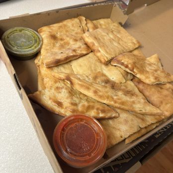 Kabul Pizza and Bakery - Bolani kachaloo traditional bread stuffed with a potato filler. Excellent. And the sauces they provide! - Pizza Near Me - Jacksonville, Florida Kabul Pizza and Bakery - Bolani kachaloo traditional bread stuffed with a potato filler. Excellent. And the sauces they provide! - Pizza Near Me - Jacksonville, Florida