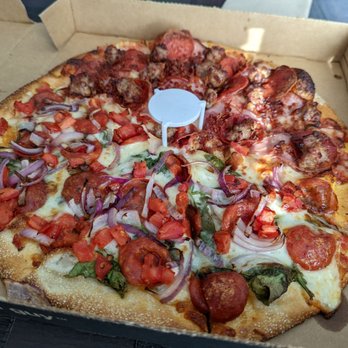 Pizza Guys - Half meat lovers and half something else my husband picked out. Medium pizza thin crust. - Pizza Near Me - San Carlos, California