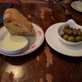 Lucia - Bread and warm olives - Italian Near Me - Dallas, Texas Lucia - Bread and warm olives - Italian Near Me - Dallas, Texas