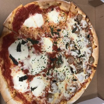 Basta Pasta Trattoria - Half Margherita Pizza and half Spicy Sausage Pizza - Italian Near Me - Cambridge, Massachusetts