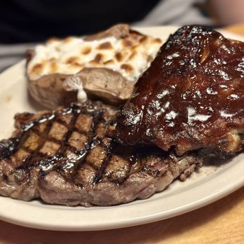 Texas Roadhouse - a plate of steak and potatoes - Steakhouses Near Me - Garland, Texas Texas Roadhouse - a plate of steak and potatoes - Steakhouses Near Me - Garland, Texas