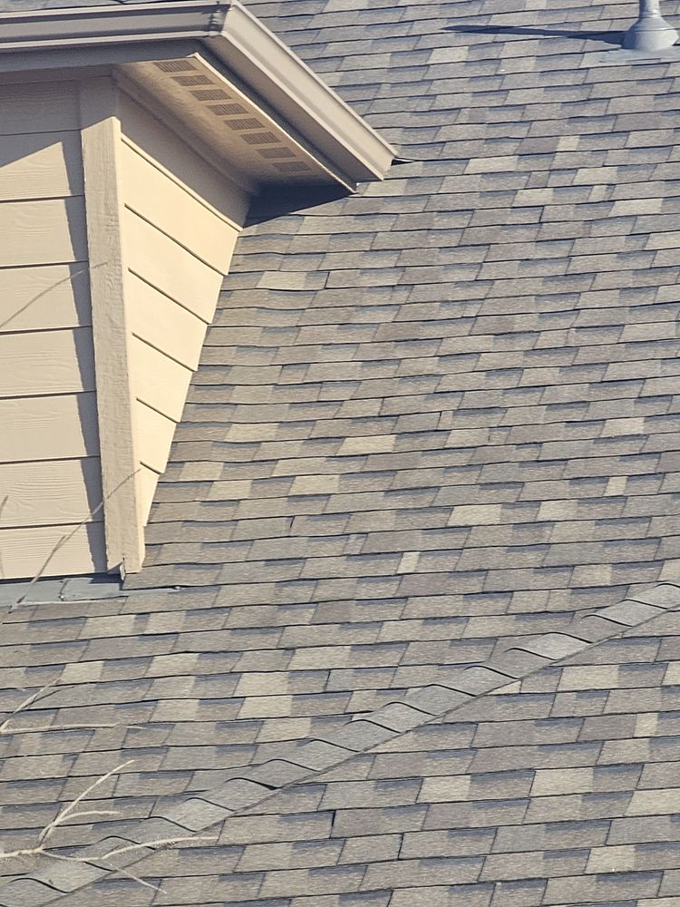 Slide of Aztec Roofing and Construction