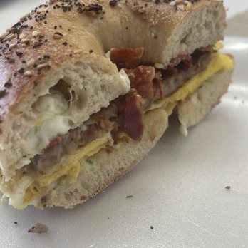 The Bagel Express - Everything bagel, bacon, sausage, and cream cheese with chives. - Bagels Near Me - Kendall, Florida The Bagel Express - Everything bagel, bacon, sausage, and cream cheese with chives. - Bagels Near Me - Kendall, Florida