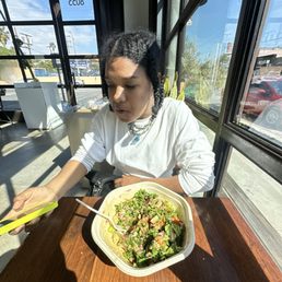 kam again eating a Harvest Bowl and doing business on her iPhone kam again eating a Harvest Bowl and doing business on her iPhone