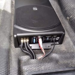 Jim's Car Audio & Alarm - Sound ordnance 8 inch powered subwoofer with custom installation into Chevy extra cab truck