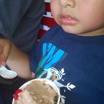 Cabarrus Creamery - Hypnotized by the deliciousness of his rocky road ice cream with gummi bears. - Ice Cream & Frozen Yogurt Near Me - Concord, North Carolina