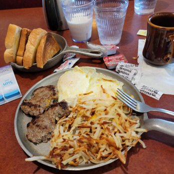 Iron Skillet - skillet breakfast. two eggs over medium hash browns sourdough toast sausage patties they cut to form here. and coffee - New American Near Me - New Paris, Ohio Iron Skillet - skillet breakfast. two eggs over medium hash browns sourdough toast sausage patties they cut to form here. and coffee - New American Near Me - New Paris, Ohio