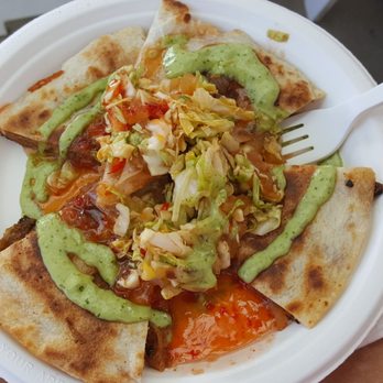 Three's Food Truck - Kalua pork quesadilla with delightful sauces! Who wouldn't want that?? - Food Trucks Near Me - Kahului, Hawaii Three's Food Truck - Kalua pork quesadilla with delightful sauces! Who wouldn't want that?? - Food Trucks Near Me - Kahului, Hawaii