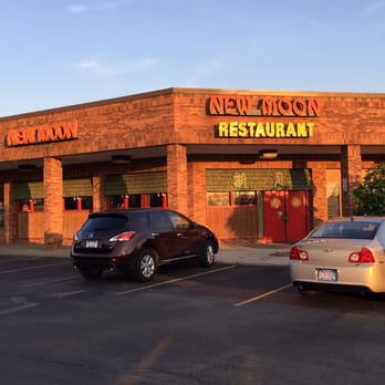 New Moon Restaurant - two cars parked in front of the restaurant - Chinese Near Me - Macomb Twp, Michigan