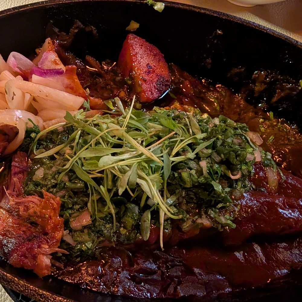 Toro Bravo - My main dish. Medium rare Picaña' over potatoes. Beautiful, Mouth-watering presentation. - Steakhouses Near Me - Reno, Nevada