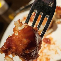 Nawab Indian Cuisine - A fork with a piece of the Gobhi Masala appetizer. It's so colorful and tasty. A culinary masterpiece!