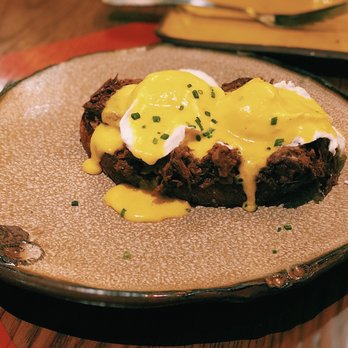 Sugarcane - Oxtail Benedict - slow roasted oxtail, poached egg, sherry hollandaise - Cocktail Bars Near Me - Las Vegas, Nevada Sugarcane - Oxtail Benedict - slow roasted oxtail, poached egg, sherry hollandaise - Cocktail Bars Near Me - Las Vegas, Nevada