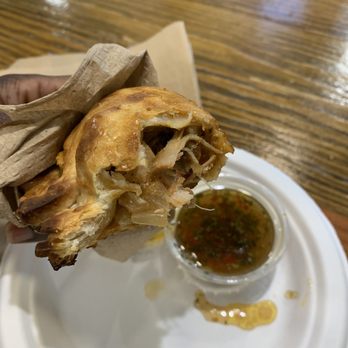 Empanada Kitchen - Chicken empanada on the inside with chimichurri sauce. - Empanadas Near Me - San Diego, California