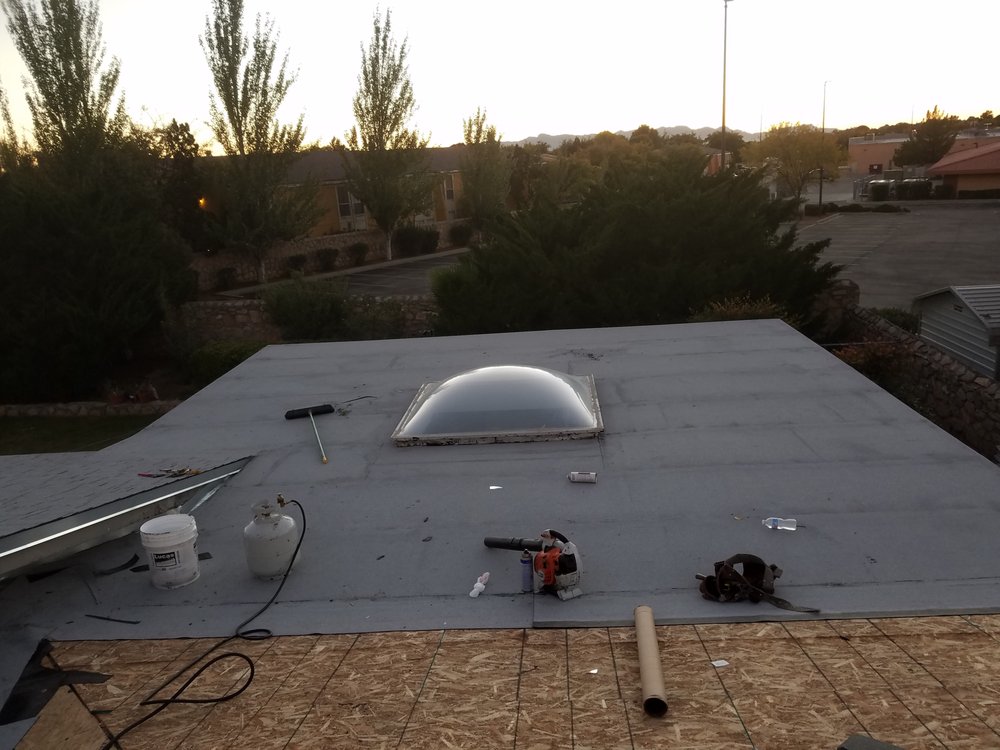 Slide of Rhino Roofing & Construction