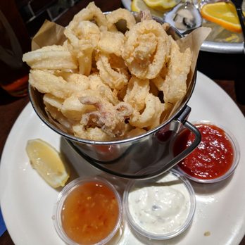 The Dutchie - Bucket of calamari with sweet/spicy dipping sauce in addition to traditional sauces - Seafood Near Me - Morro Bay, California