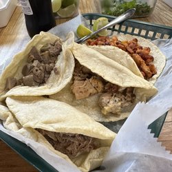 Julia's Taqueria - Tacos: pastor (top), pollo (middle), barbacoa (bottom), lengua (left) - you add your toppings from the bar.