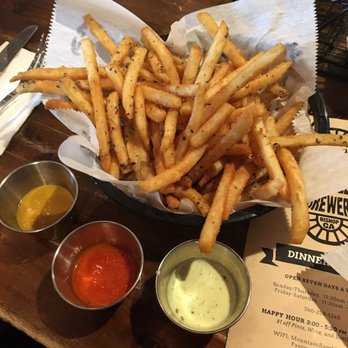 Mountain Rambler Brewery - Fries with an Aoli dipping sauce,  tomato sauce and mustard.  Stick to the catsup! - New American Near Me - Bishop, California