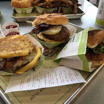 BurgerFi - L-to-R Steak stack, breakfast burger, chicken sandwich - Burgers Near Me - Avon, Connecticut BurgerFi - L-to-R Steak stack, breakfast burger, chicken sandwich - Burgers Near Me - Avon, Connecticut