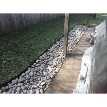 Sims Grass - a picture of a car parked on the side of the road - Firewood Near Me - Bedford, Texas