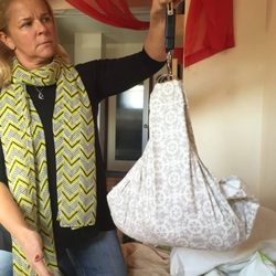 Kelly Olmstead, LM, CPM - Weighing a baby on day 3