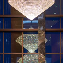 Armstrong Auditorium - Swarovski STRASS-trimmed crystal chandeliers adorn the Grand Lobby at Armstrong Auditorium in Edmond, Okla.