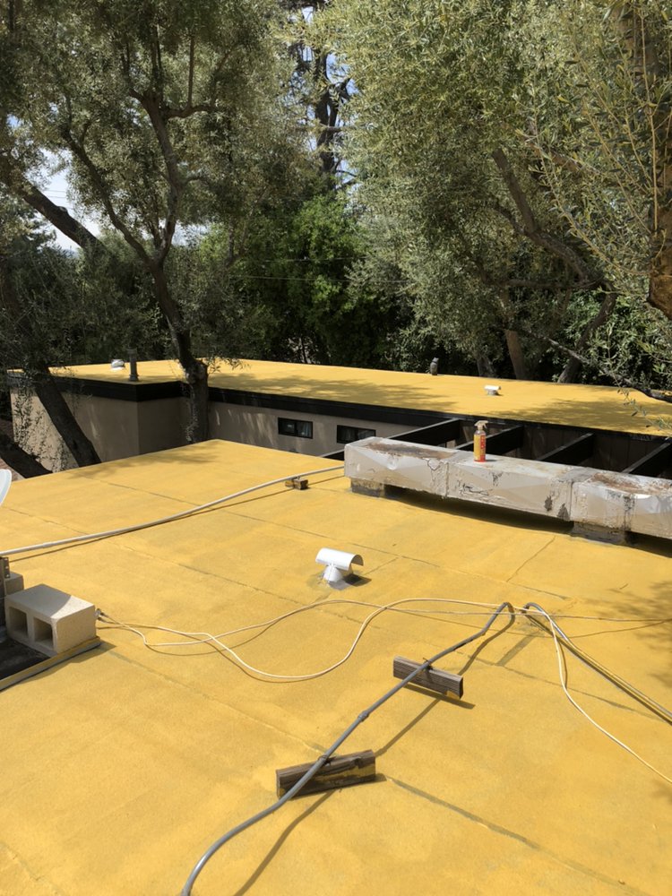 Slide of Reno's Roofing