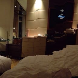 Panoramic view of deluxe king with a rollaway bed. Left window not much of 'city' view. Right window is for bathroom. Panoramic view of deluxe king with a rollaway bed. Left window not much of 'city' view. Right window is for bathroom.