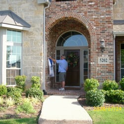 Benchmark Dry Cleaning - Garments hung by your door