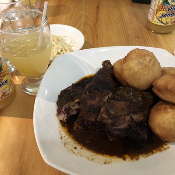 Simone's Caribbean Restaurant - Jerk chicken with johny cakes and pineapple ginger juice - Caribbean Near Me - Toronto, Ontario Simone's Caribbean Restaurant - Jerk chicken with johny cakes and pineapple ginger juice - Caribbean Near Me - Toronto, Ontario