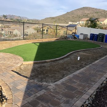 Catalina Hardscapes - This Bonsall customer added Riviera Monterey 50 turf, surrounded by Az river rock 1-3" and Orco pavers border and firepit are - Artificial Turf Near Me Catalina Hardscapes - This Bonsall customer added Riviera Monterey 50 turf, surrounded by Az river rock 1-3" and Orco pavers border and firepit are - Artificial Turf Near Me