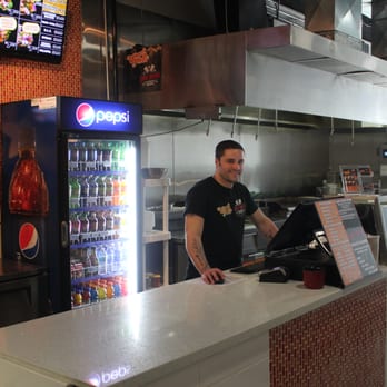 U Need A Pita - a man behind the counter - Burgers Near Me - Welland, Ontario U Need A Pita - a man behind the counter - Burgers Near Me - Welland, Ontario