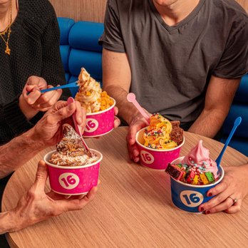 16 Handles - a group of people sitting around a table eating ice cream - Ice Cream & Frozen Yogurt Near Me - Hoboken, New Jersey 16 Handles - a group of people sitting around a table eating ice cream - Ice Cream & Frozen Yogurt Near Me - Hoboken, New Jersey