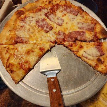 Pino's Restaurant & Pizza - a half eaten pizza - Pizza Near Me - Lawrenceville, Virginia Pino's Restaurant & Pizza - a half eaten pizza - Pizza Near Me - Lawrenceville, Virginia