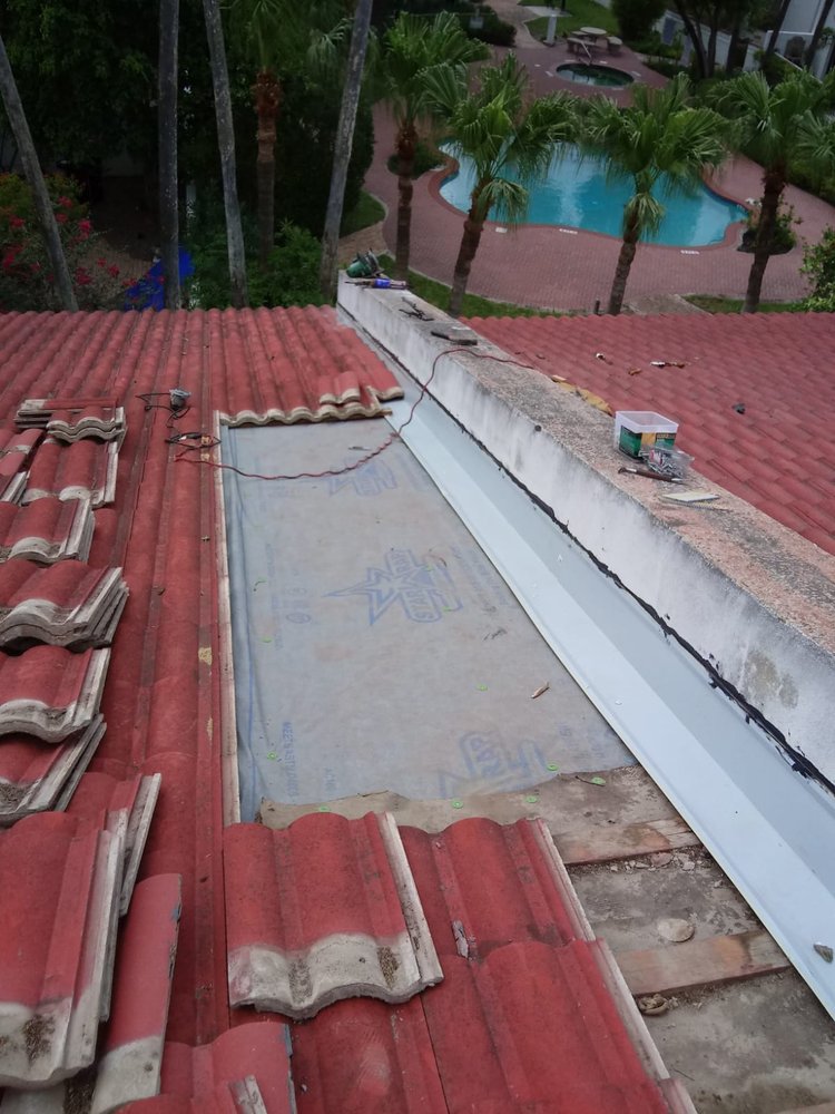 Slide of Martinez Roofing and Restoration