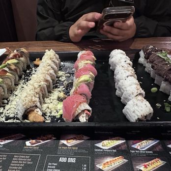 Sake 2 Me Sushi - Dragon Lover Roll, Crunch Roll, Hawaiian Roll, California Roll, Grilled Beef and Asparagus Roll. (left to right) - Sushi Bars Near Me - Cerritos, California Sake 2 Me Sushi - Dragon Lover Roll, Crunch Roll, Hawaiian Roll, California Roll, Grilled Beef and Asparagus Roll. (left to right) - Sushi Bars Near Me - Cerritos, California