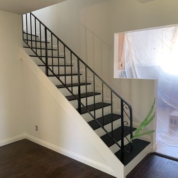 Skyline Flooring - Before- brown stairs, After- beautiful black & white refinished and painted stairs - Flooring Near Me - Sherman Oaks, California Skyline Flooring - Before- brown stairs, After- beautiful black & white refinished and painted stairs - Flooring Near Me - Sherman Oaks, California