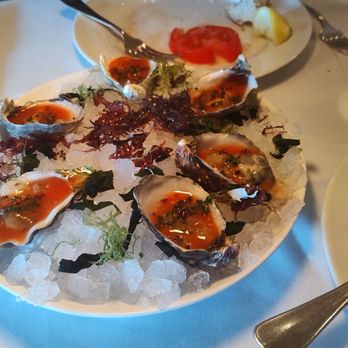 LPM Restaurant & Bar - Oysters dressed with crispy quinoa- a very bad idea. Grit is not a desired texture for a raw oyster. - Mediterranean Near Me - Las Vegas, Nevada LPM Restaurant & Bar - Oysters dressed with crispy quinoa- a very bad idea. Grit is not a desired texture for a raw oyster. - Mediterranean Near Me - Las Vegas, Nevada