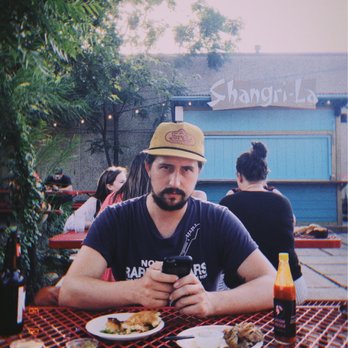 Shangri-La - Amazing patio ft. my "not stoked to have his photo taken" partner :) - Lounges Near Me - Austin, Texas Shangri-La - Amazing patio ft. my "not stoked to have his photo taken" partner :) - Lounges Near Me - Austin, Texas