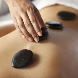 Hekang Health Center - Hot stones soothe the wonders from the deep tissue massage